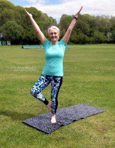 Yoga teacher Amanda Powell (Anjali) in an outdoor Yoga class at Creigiau, Cardiff