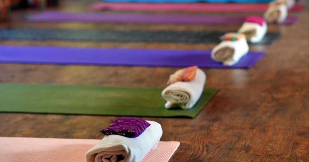 Yoga mats laid out ahead of a Yoga Day Retreat in a cosy woodland chalet in Cardiff, South Wales. Picture copyright: https://www.richardwilliamsphoto.co.uk/